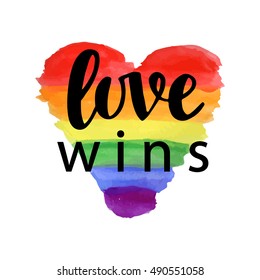 Love wins. Pride slogan. Gay rights concept. Vector hand lettering on bright watercolor rainbow heart, homosexuality emblem. Banner, poster, placard, invitation card typographic design