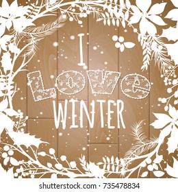 I love the winter. lettering lace letters on wooden background