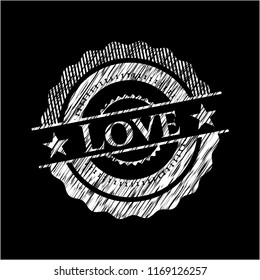 Love written on a chalkboard