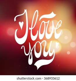 i love you handwriting. blurred background.