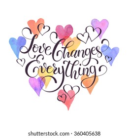 I love you lettering with watercolor hearts on background. Modern typography. Colorful  greeting card calligraphy design. 