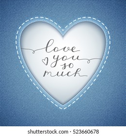 love you so much, vector lettering in heart frame on denim texture