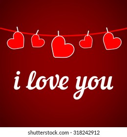 i love you. Red hearts hanging on the clothesline. valentine card. valentine's day