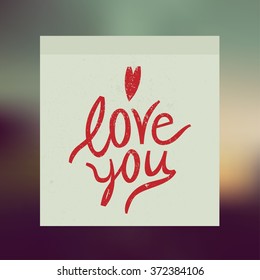 i love you sticker. blurred background.