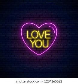 Love you text in heart shape in neon style. Happy Valentines Day neon glowing festive sign on a dark brick wall background. Holiday greeting card with lettering. Vector illustration.