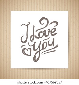 i love you, vector handwritten text on cardboard background
