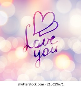 love you, vector hanwritten text on beautiful blurred background