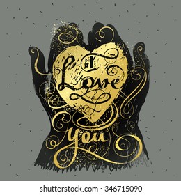 I love you, written in golden heart in hands shape silhouette. Hand drawn lettering romantic inspiration quote.