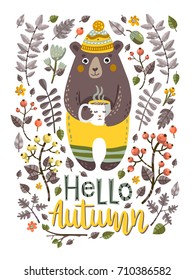 Lovely autumn card with a bear, a cup, leaves, flowers, acorns, berries with the inscription Hello autumn. Perfect for greeting cards, postcards, t-shirt design and other