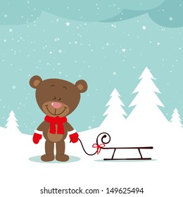 Lovely bear in winter with slide