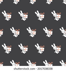 Lovely Bunnies and Their Gifts Vector Graphic Seamless Pattern can be use for background and apparel design