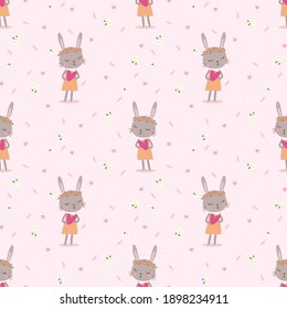 Lovely bunny hold little heart seamless pattern