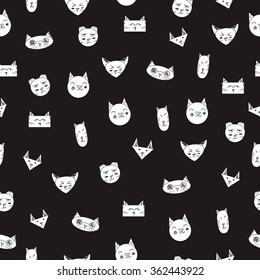 Lovely cats. Seamless pattern. Black background with white cats