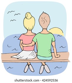 Lovely couple sitting on a bench by the sea