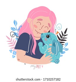 Lovely friendship with pet. Little cute girl hugs rabbit.