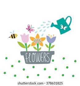 Lovely garden with flowers and watering-can