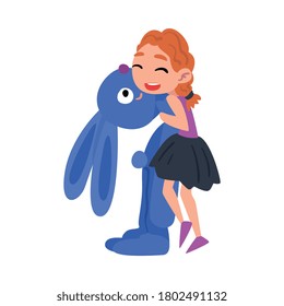 Lovely Girl Hugging Huge Blue Bunny, Adorable Kid Playing with her Favorite Toy Cartoon Vector Illustration on White Background