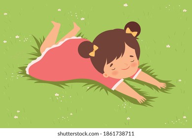 Lovely Girl Lying Down on Green Lawn on her Stomach, Cute Kid Having Fun Outdoors Cartoon Vector Illustration