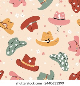 Lovely illustrated cowboy hats with different ornaments, cactus, horseshoe, stars. Vector hand drawn illustration, seamless pattern, great for textiles, wallpapers, wrapping.