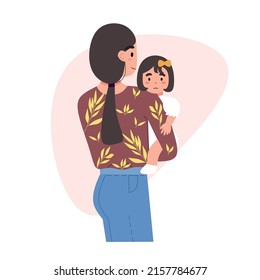 Lovely mother's back view gently embrace her cute baby with love and affection. Happy international mothers day, hugging a small boy, parent and child, parenting, motherhood concept
