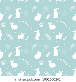 Lovely rabbits with easter eggs and flowers. Cute childish seamless pattern in cartoon style.