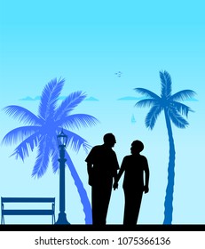 Lovely retired elderly couple walking on the beach, one in the series of similar images silhouette