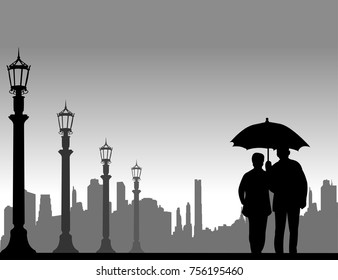 Lovely retired elderly couple walking under the umbrella on the street in autumn or fall, one in the series of similar images silhouette