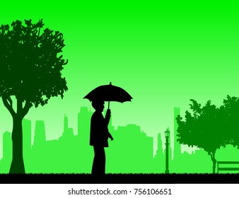 Lovely retired elderly woman walking under the umbrella in park in autumn or fall, one in the series of similar images silhouette
