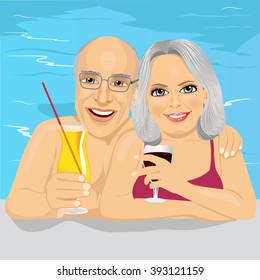 lovely senior couple drinking red wine and cocktail in pool 