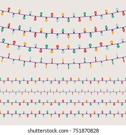 Lovely set of simple vector limited colours flat design Christmas lights garlands with light bulbs of different shapes and forms. Ideal for Xmas winter holiday season graphic and web design