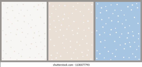 Lovely Simple Hand Drawn Stars Seamless Vector Pattern. White Tiny Stars Islolated on a Beige and Blue Background. Cute Abstract Starry Sky. Beige Stars on a White Background. 