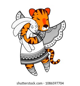 Lovely tiger with wings in beautiful clothes with a plush rabbit in the paws.