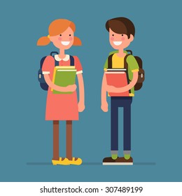 Lovely vector character flat design on primary or elementary school children students little boy and girl kids standing full length smiling holding books and wearing backpacks 