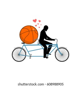 Lover basketball. Guy and ball on tandem. Lovers of cycling. Man rolls  bicycle. Joint walk on street. Romantic date. Love sport play game 
