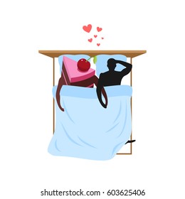Lover of cakes. Man and piece of cake in bed. Lovers in bedroom. Blankets and pillows. Glutton of Lifestyle
