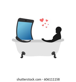 Lover of gadgets. Man and smartphone in bath. wash in bathroom. Always together device. I love my phone.

