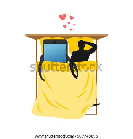 Lover of gadgets. Man and smartphone In bed. Blankets and pillows. Always together device. I love my phone.