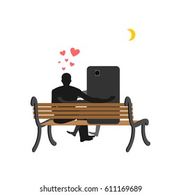 Lover of gadgets. Man and smartphone Sitting on bench. Always together device. I love my phone.
