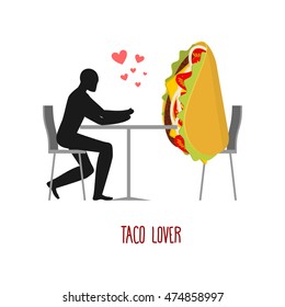 Lover taco. Lovers in cafe. Man and fastfood sitting at table. Mexican food in restaurant. Romantic date in public place.  
