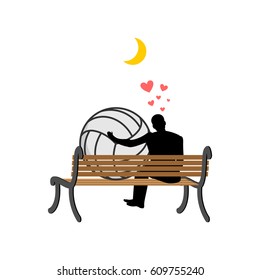 Lover volleyball. Guy and ball sitting on bench. Romantic date. Love sport play game 