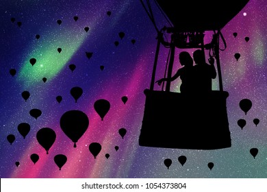 Lovers in balloon at night. Vector illustration with silhouette of loving couple. Landscape with hot air balloons. Northern lights in starry sky