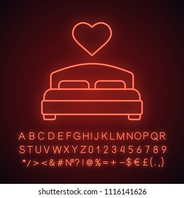 Lovers bed neon light icon. Double bed with heart shape above. Glowing sign with alphabet, numbers and symbols. Vector isolated illustration