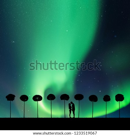 Lovers between trees in park at night. Vector illustration with silhouette of loving couple. Northern lights in starry sky. Colorful aurora borealis