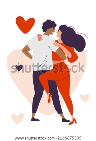 Lovers dance the tango. Passionate dance. Dancers in red and black dance Salsa and bachata. A man and a woman move at a dance festival.
