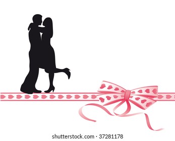 Lovers kissing on a very colorful bow