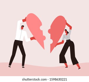 Lovers man and woman stack their heart like a puzzle. Isolated on white background.