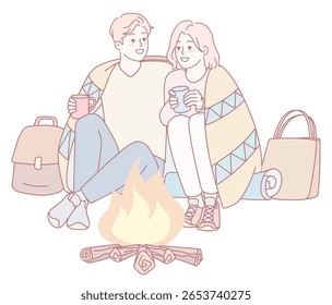 A loving couple cuddles closely under a warm blanket next to a crackling campfire, enjoying the cozy atmosphere
