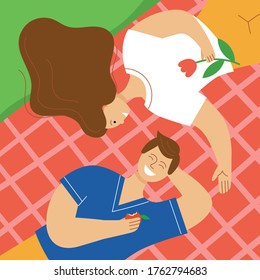 Loving couple having a picnic in the park. A man and a woman lie on a plaid and laughing. The concept of relaxing on a weekend in spring or summer. Flat color vector illustration.