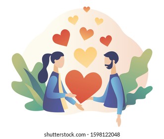 Loving couple holding heart in hands.. Romantic date concept. Characters Valentine day. Modern flat cartoon style. Vector illustration on white background