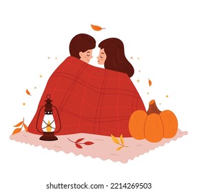 Loving Couple On An Autumn Picnic. Lovers In A Blanket. Romantic Setting. Kerosene Lamp And Pumpkin.